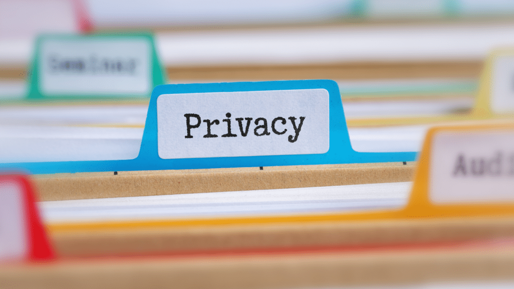 Close-up of a blue file folder tab labeled 'Privacy'